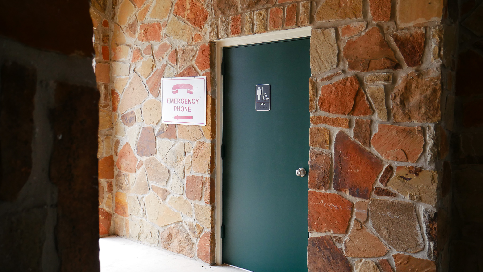 Renovated stone park restroom building at Bridgewood HOA