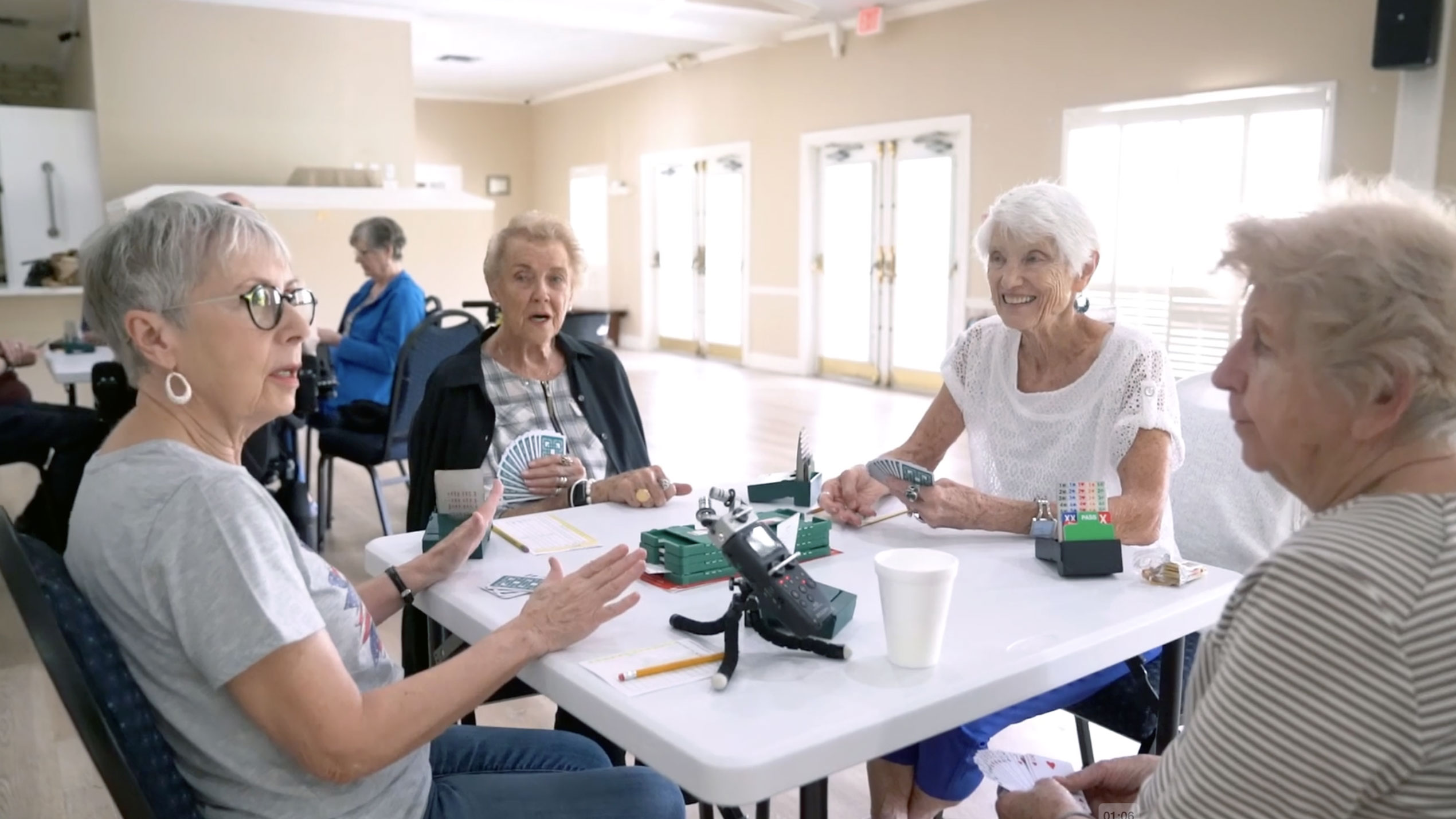 CountryPlace residents playing cards together in the clubhouse