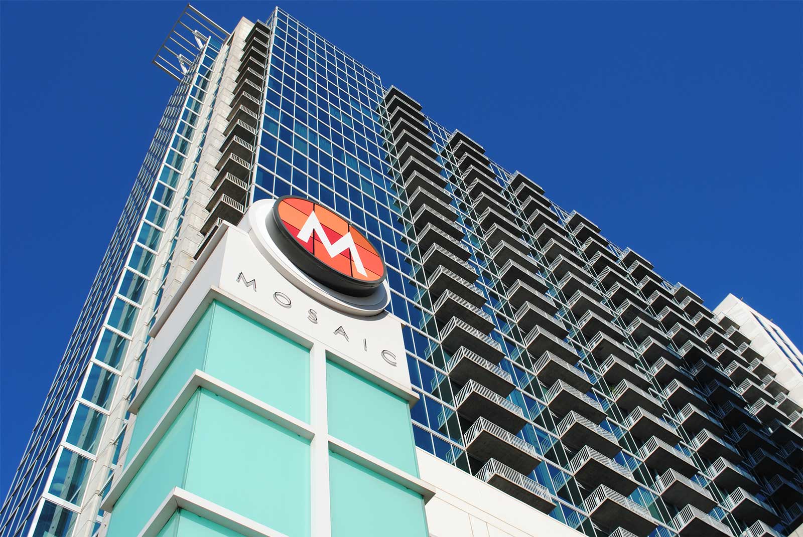 The Mosaic Condominium tower and signage in Houston